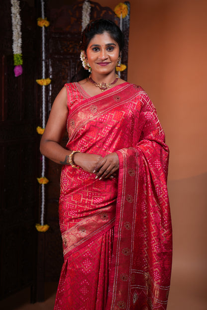 Rani pink bandhani style georgette saree with self stone work design border and pallu