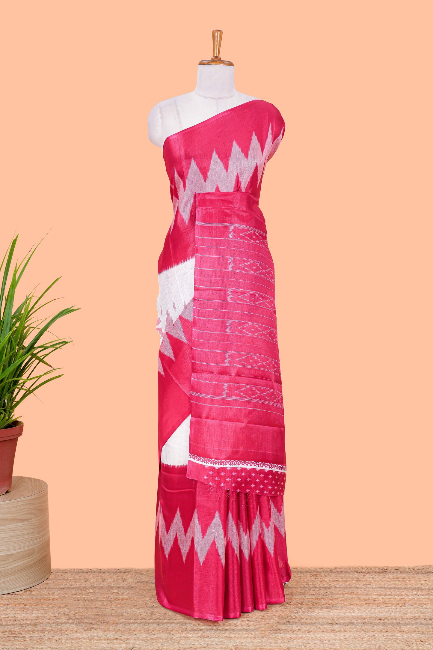 Pink & white geometric ikkat style south cotton saree with striped pallu and blouse