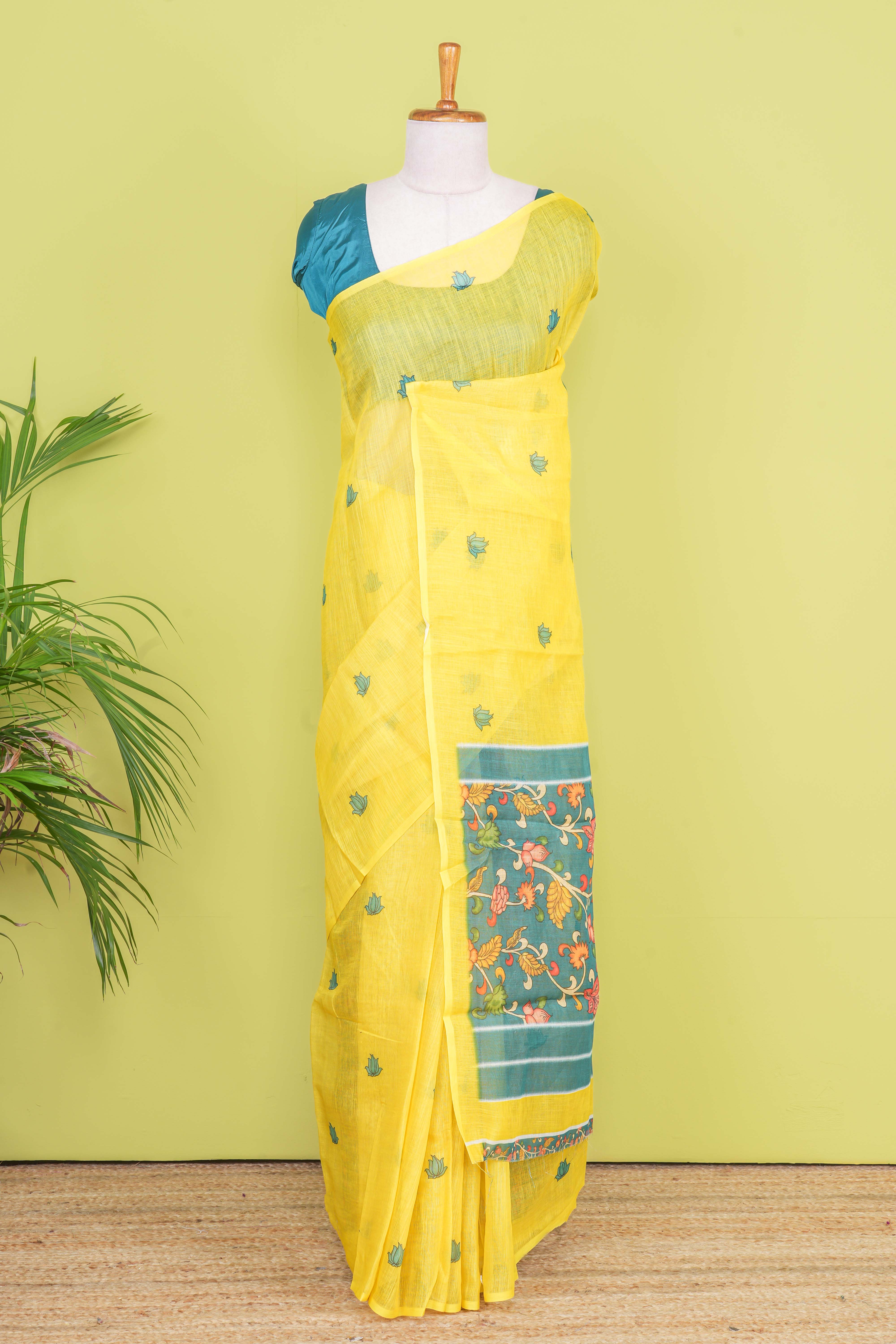 Yellow Linen Saree Flower Motifs Across The Body With Contrast Floral Design Pallu Along With Blouse