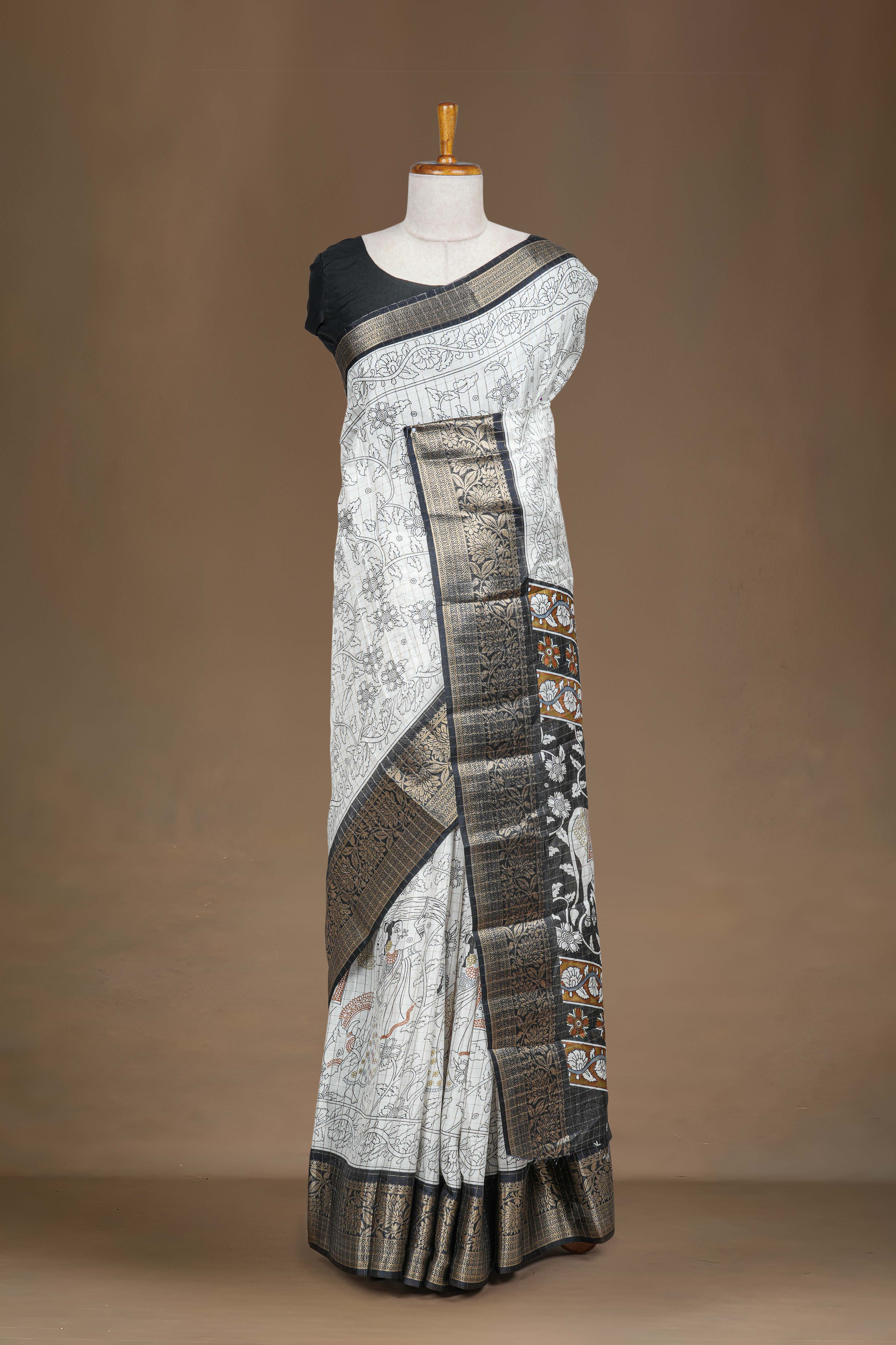 Dola Silk Saree Pen Kalamkari Print Across The Body With Contrast Floral Zari Weaving Border Along With Zari Stripes Blouse