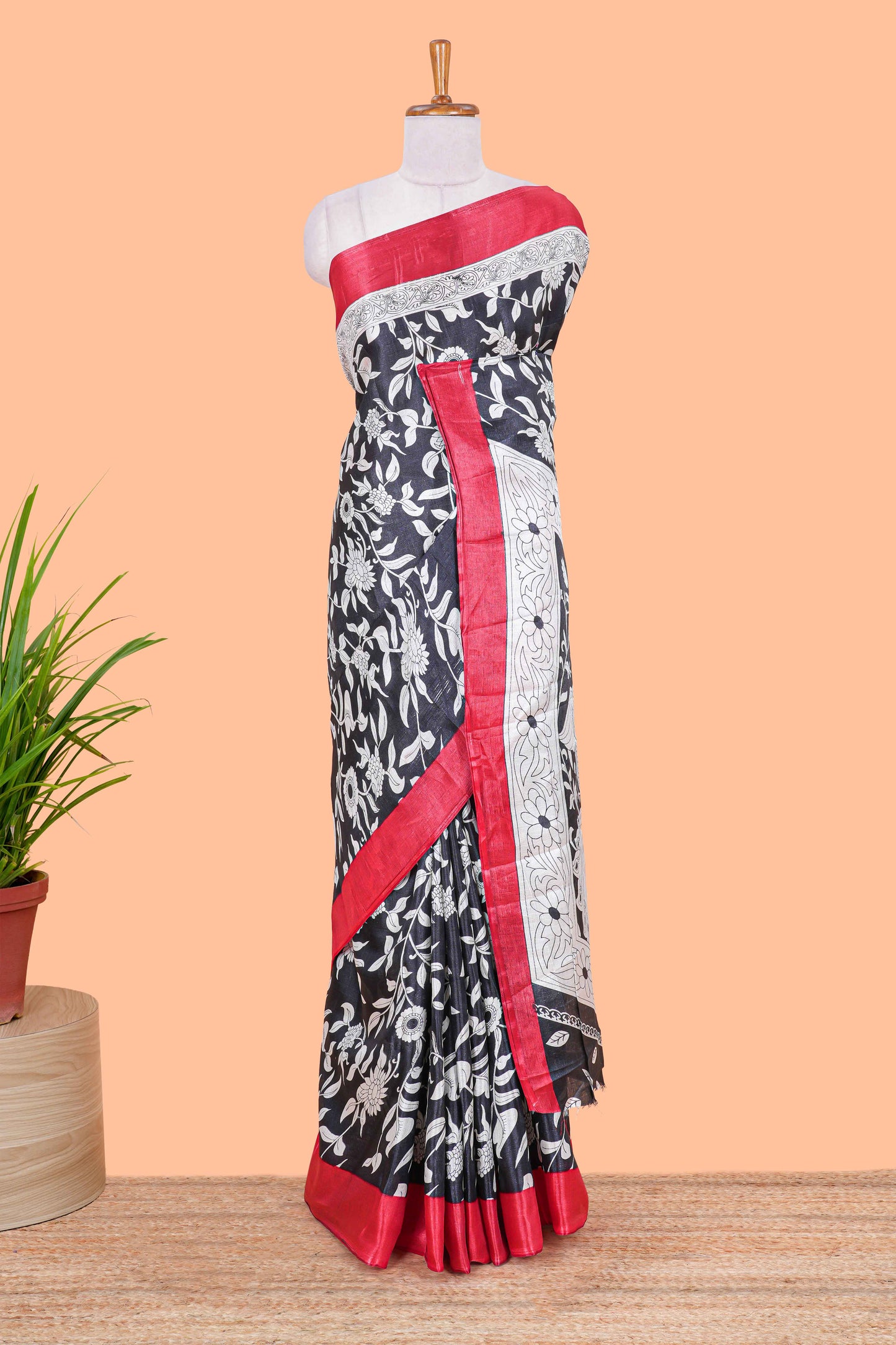 Black floral design kalamkari print south cotton saree with contrast border and matching blouse