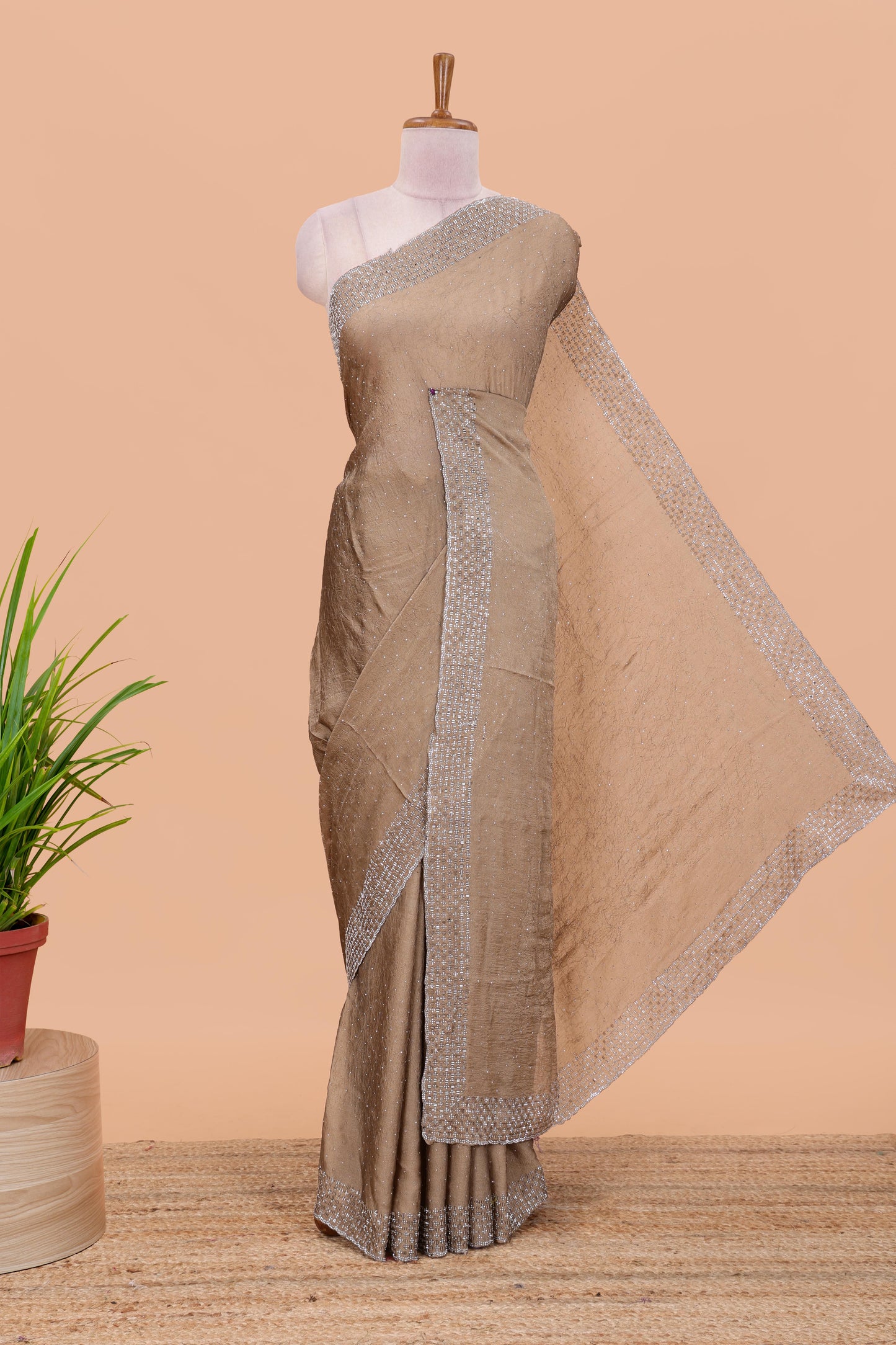 Gold chiffon georgette crush saree with all-over stone work, stone & beads border, and short stone work pallu with contrast embroidery blouse