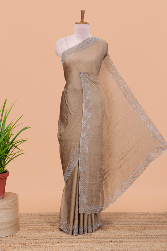 Gold chiffon georgette crush saree with all-over stone work, stone & beads border, and short stone work pallu with contrast embroidery blouse