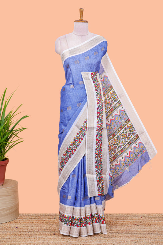 Blue peacock zari butta dola silk saree with contrast floral vine border and printed blouse