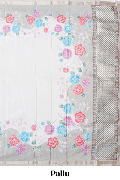 Cream floral vines art tussar saree with contrast pastel green blouse and border