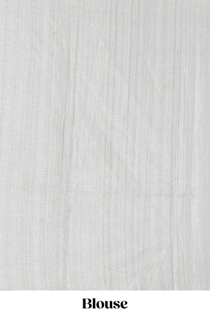 Cream floral vines art tussar saree with contrast pastel green blouse and border