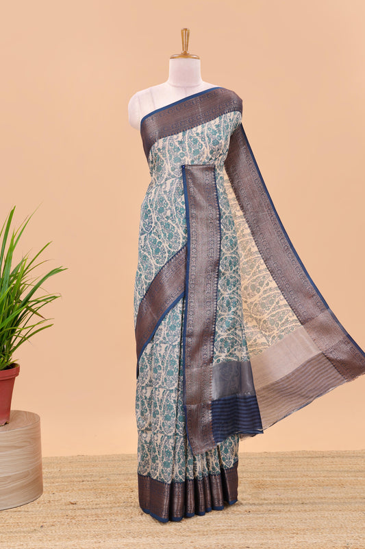 Cream paisley print chanderi cotton saree with contrast zari border and pallu