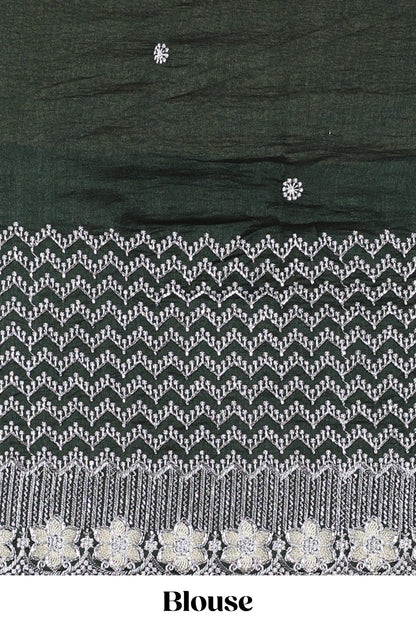 Green designer georgette space silk saree with heavy stone & beads work, short pallu and contrast sequin embroidered blouse