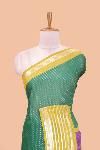 Green moss chiffon saree with jari weaving, contrast border & printed blouse
