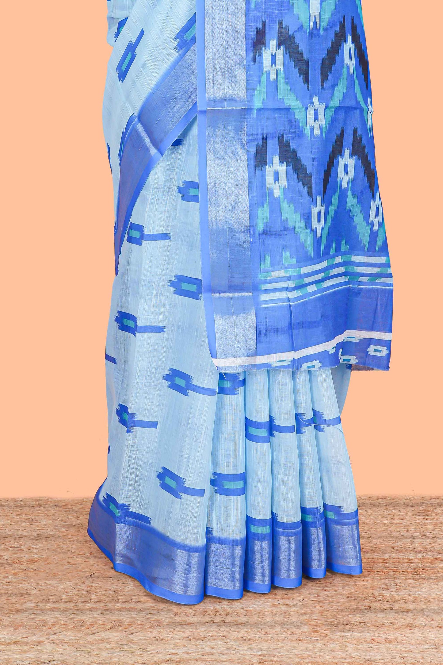 Sky blue Ikkat style linen cotton saree with contrast border and pallu
