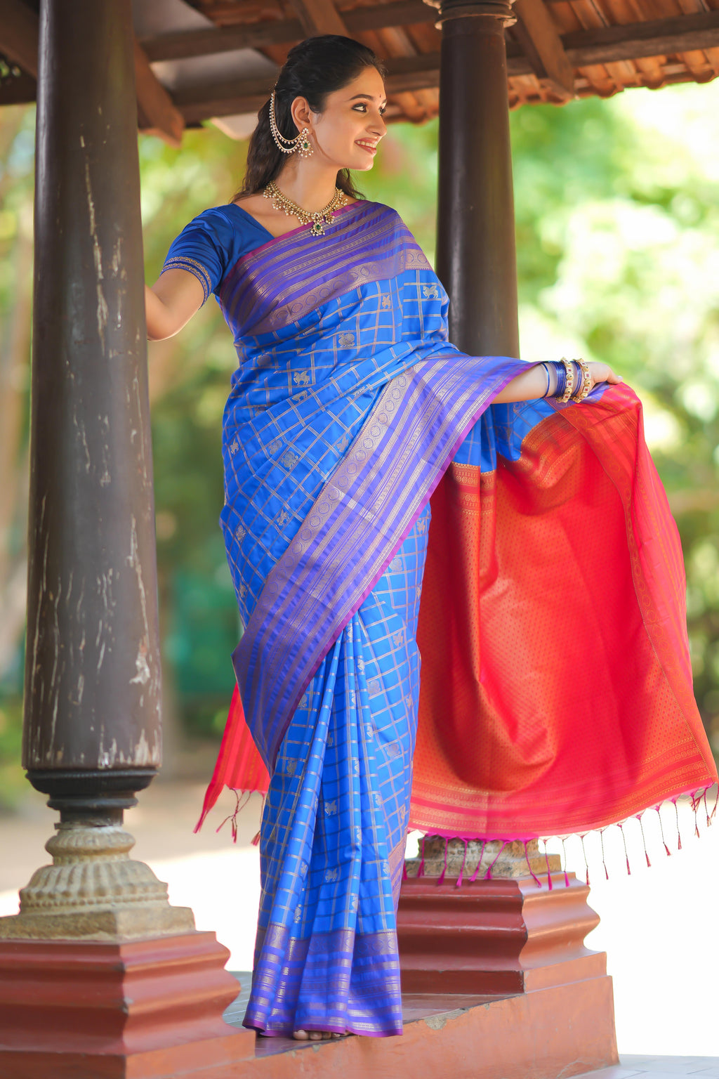 Blue checked peacock and unicorn motifs design semi soft silk saree with contrast border and blouse