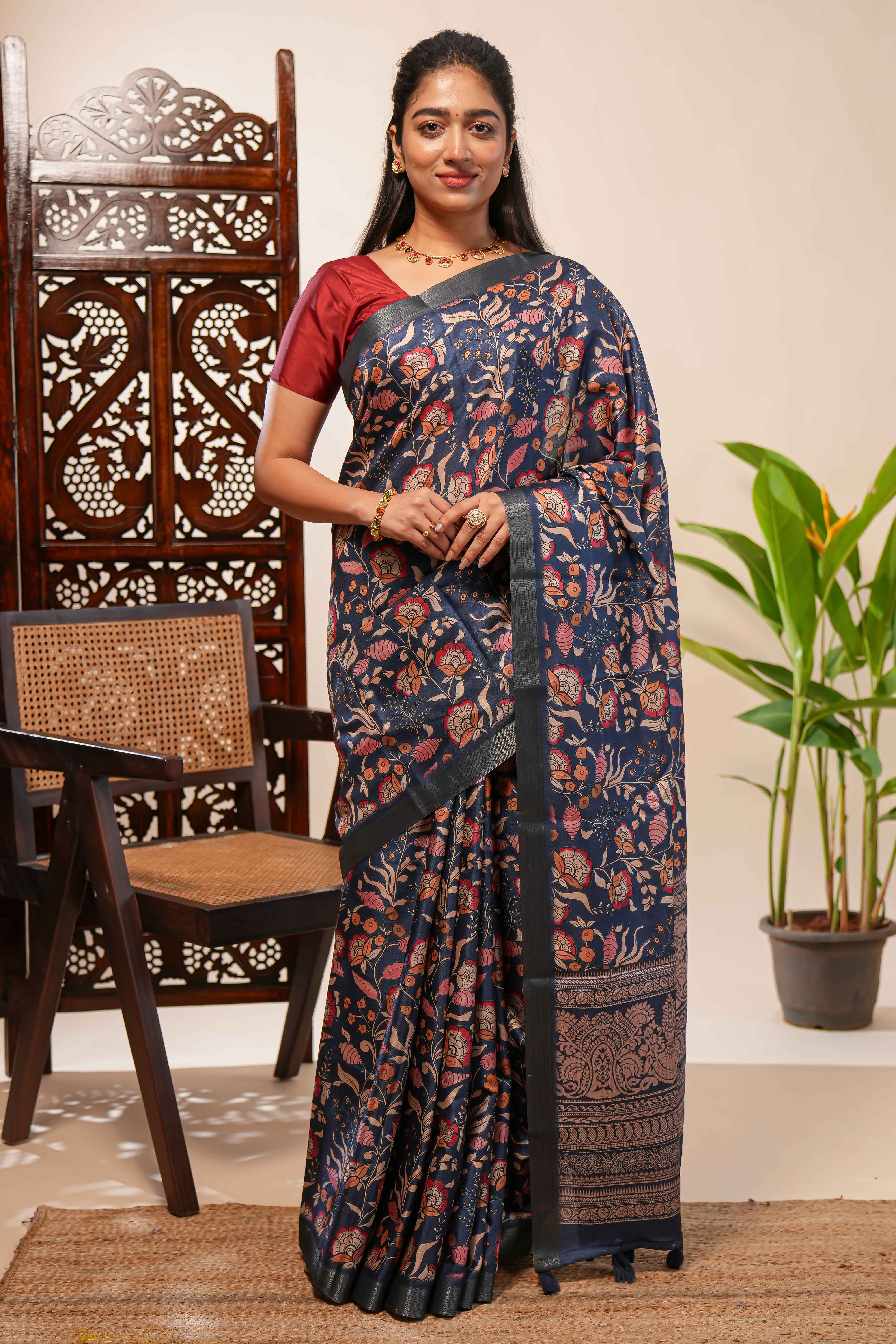 Blue floral design tussar saree with self zari border and matching blouse
