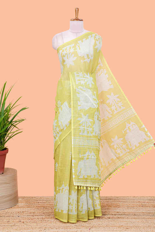 Lemon yellow linen cotton palm tree and elephant print saree with self border and matching printed blouse
