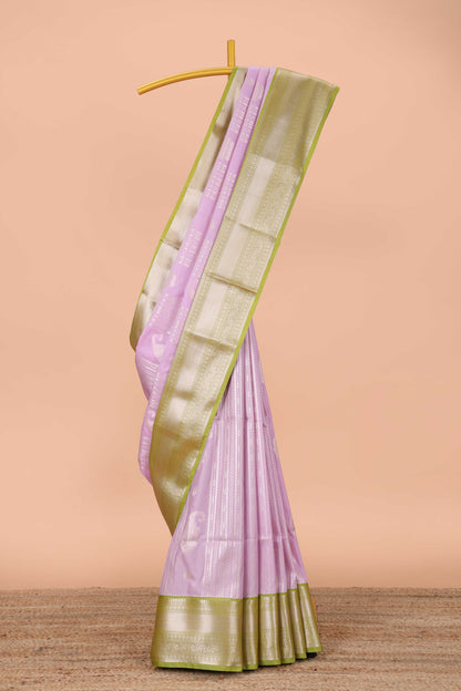 Lavender semi soft silk banarasi style saree with gold zari stripes and contrast border