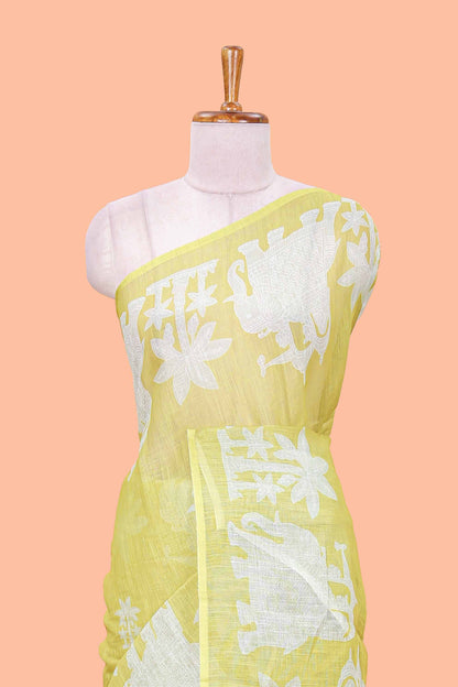 Lemon yellow linen cotton palm tree and elephant print saree with self border and matching printed blouse