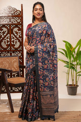 Blue floral design tussar saree with self zari border and matching blouse