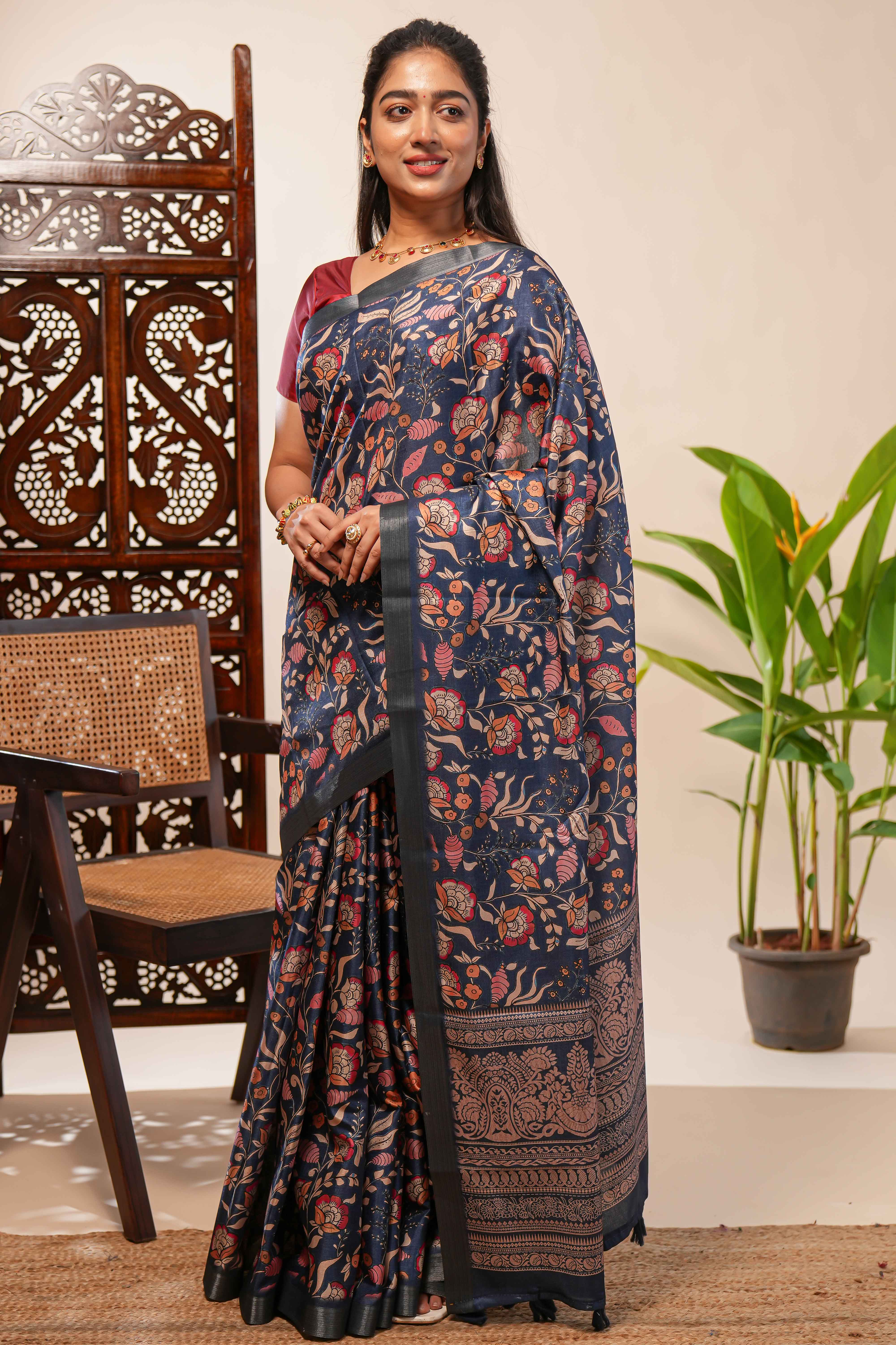Blue floral design tussar saree with self zari border and matching blouse