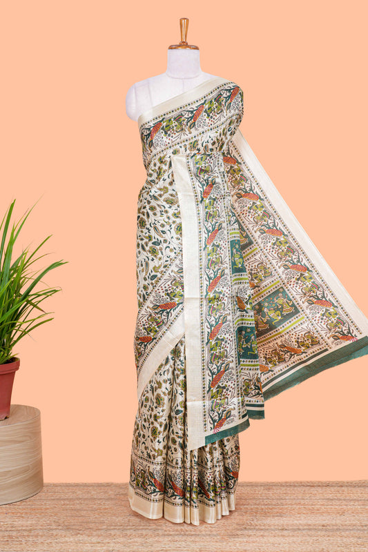 Cream khadi cotton saree with green kalamkari print on body and pallu