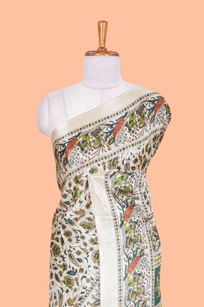 Cream khadi cotton saree with green kalamkari print on body and pallu