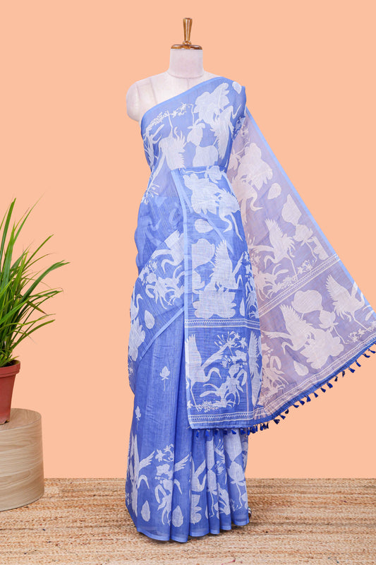 Blue linen cotton floral and crane birds print saree with self border and matching printed blouse