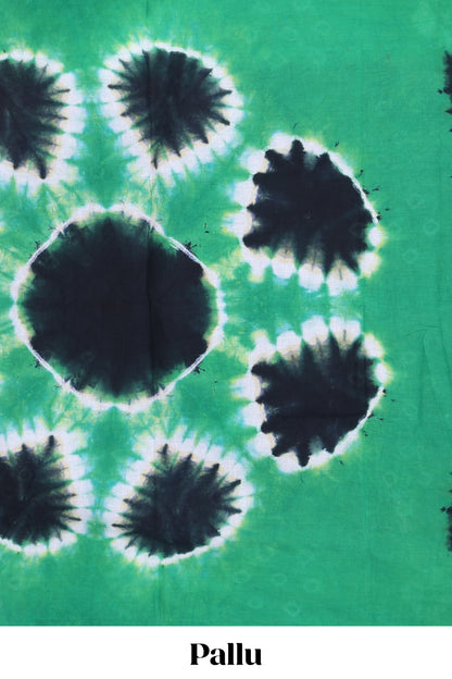 Navy blue batik print sungudi cotton saree with contrast batik border and pallu