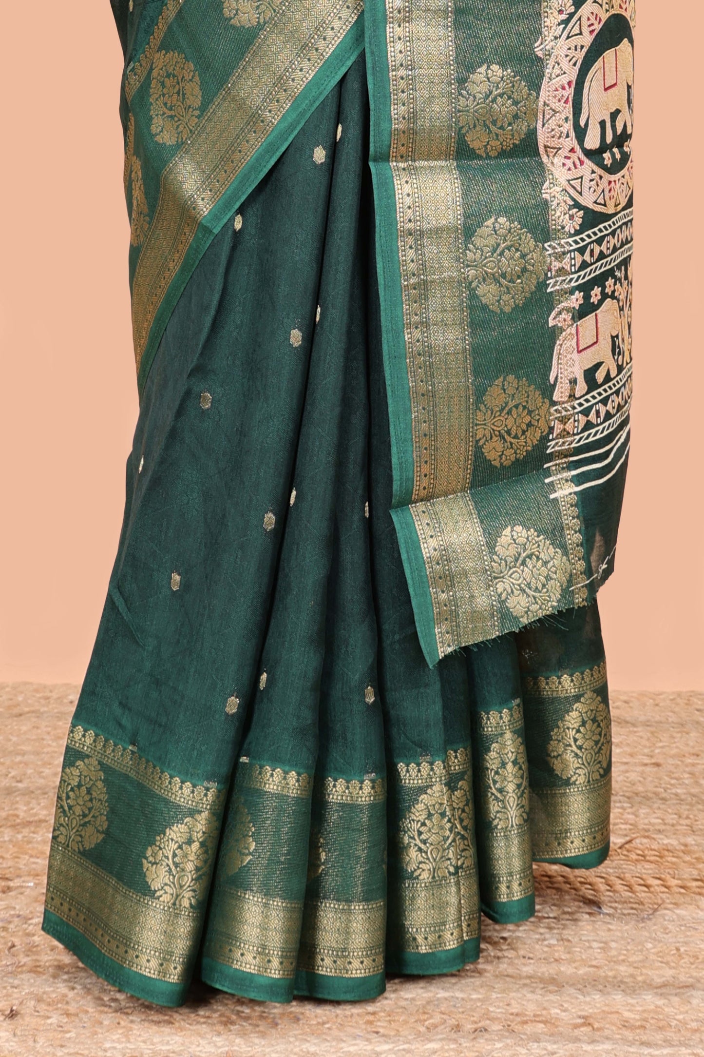 Green viscose dola silk saree with all-over zari butta, elephant motif pallu & contrast blouse