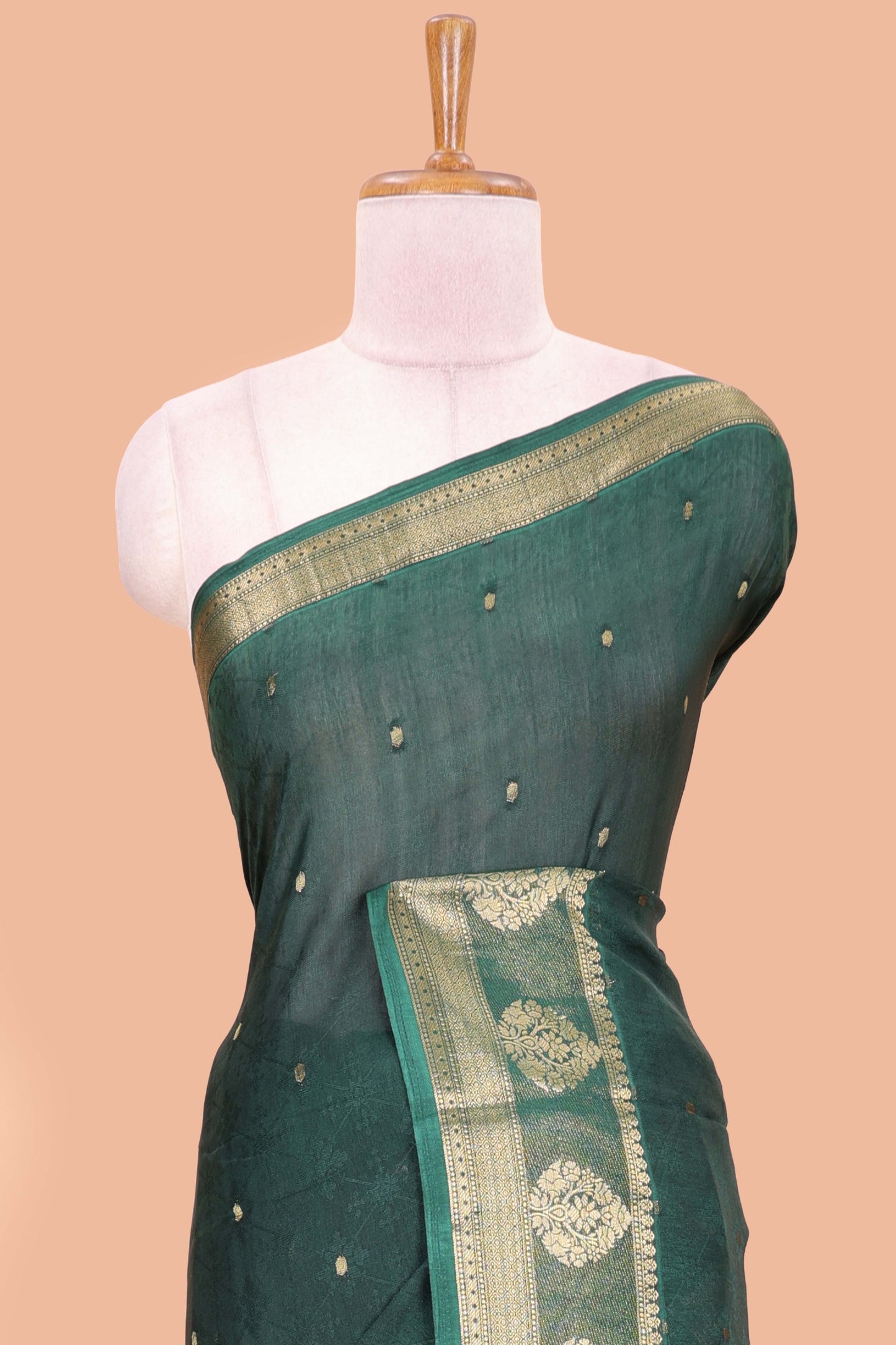 Green viscose dola silk saree with all-over zari butta, elephant motif pallu & contrast blouse