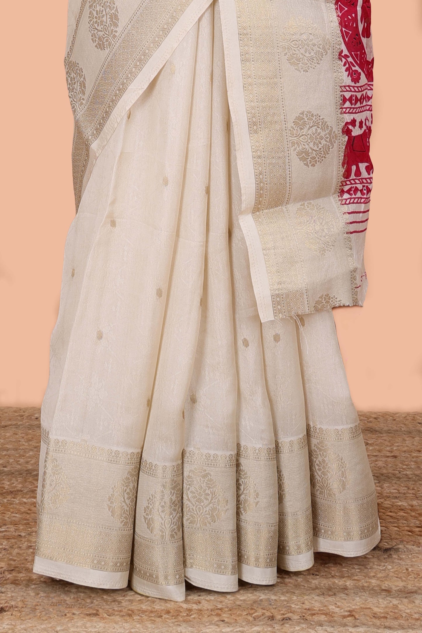 White viscose dola silk saree with all-over zari butta, elephant motif pallu & contrast blouse