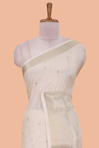 White viscose dola silk saree with all-over zari butta, elephant motif pallu & contrast blouse