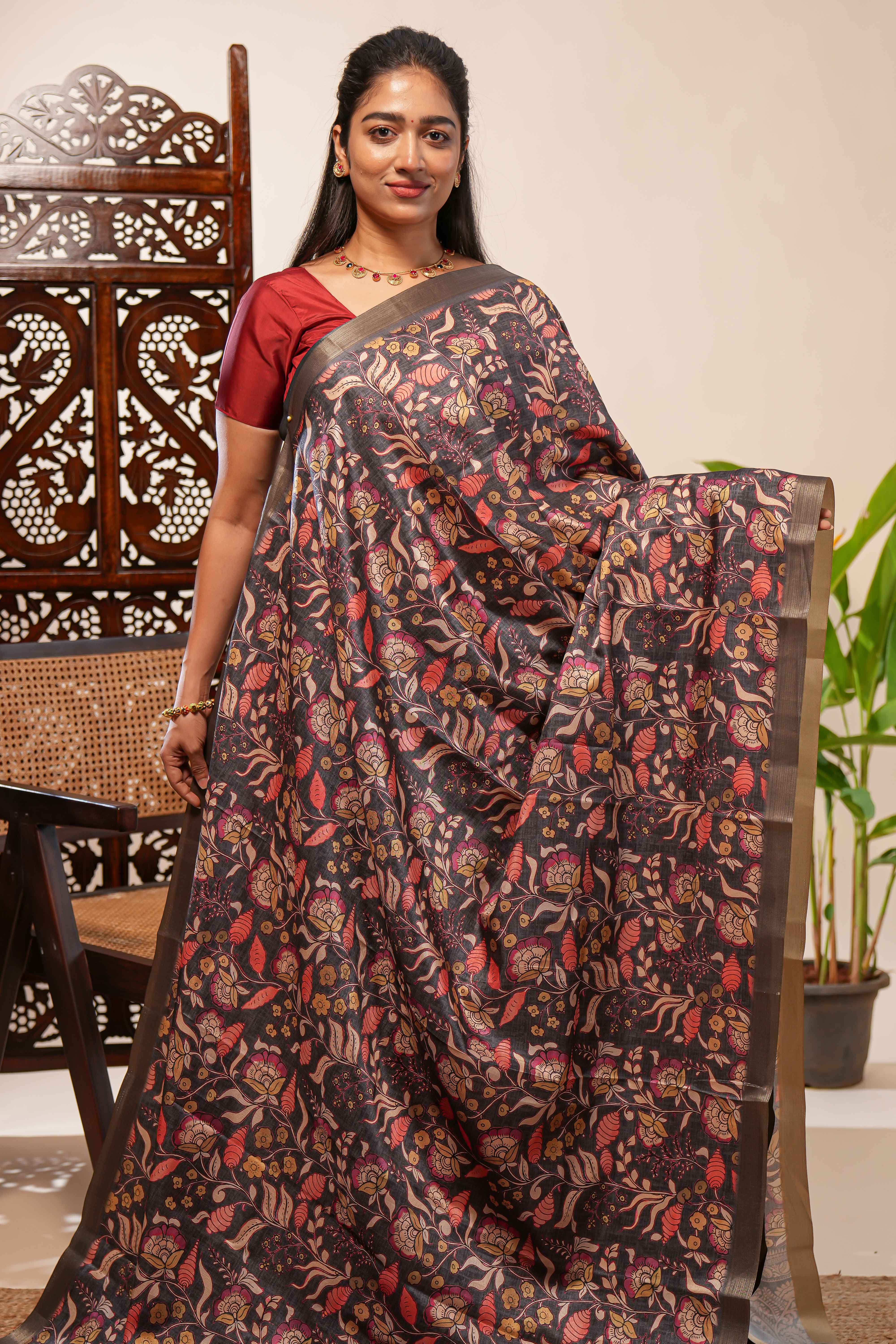 Grey floral design tussar saree with self zari border and matching blouse