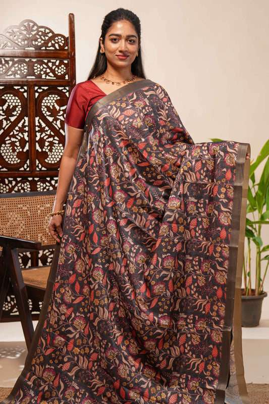 Grey floral design tussar saree with self zari border and matching blouse