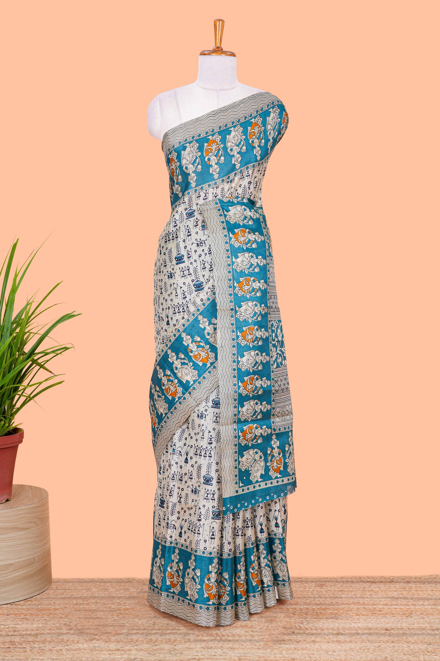 Cream khadi cotton saree with warli design print on body and pallu