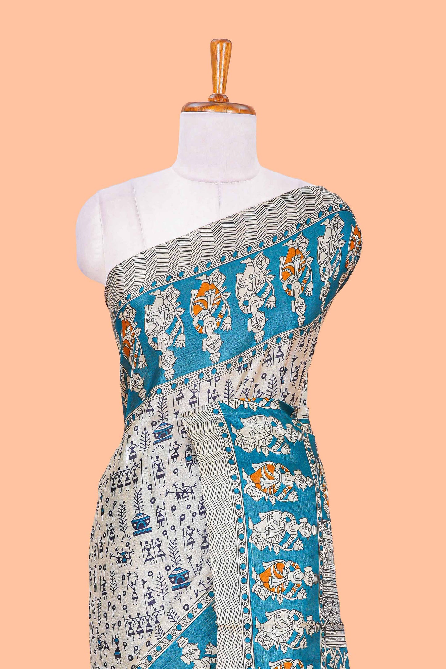 Cream khadi cotton saree with warli design print on body and pallu