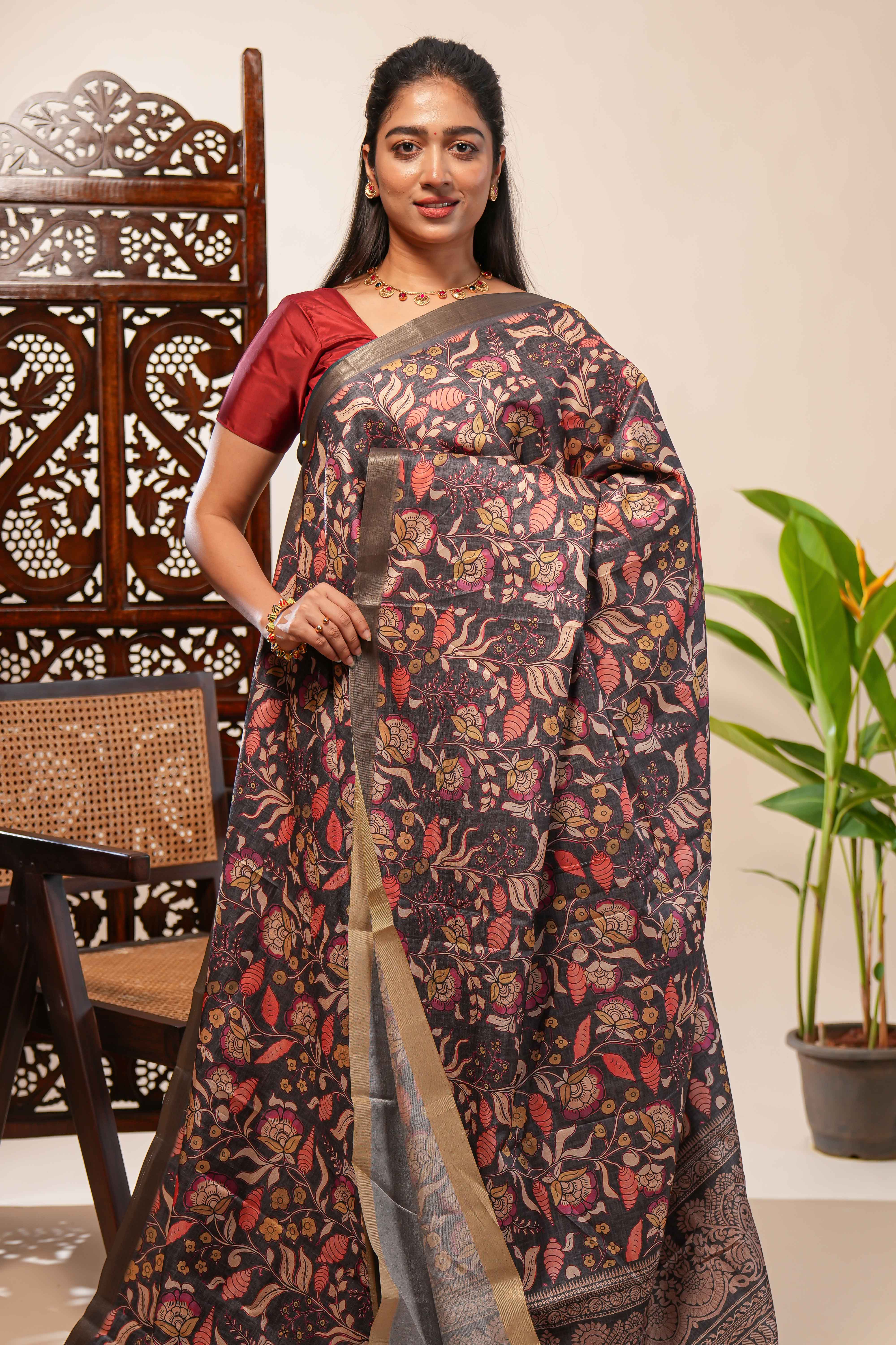 Grey floral design tussar saree with self zari border and matching blouse