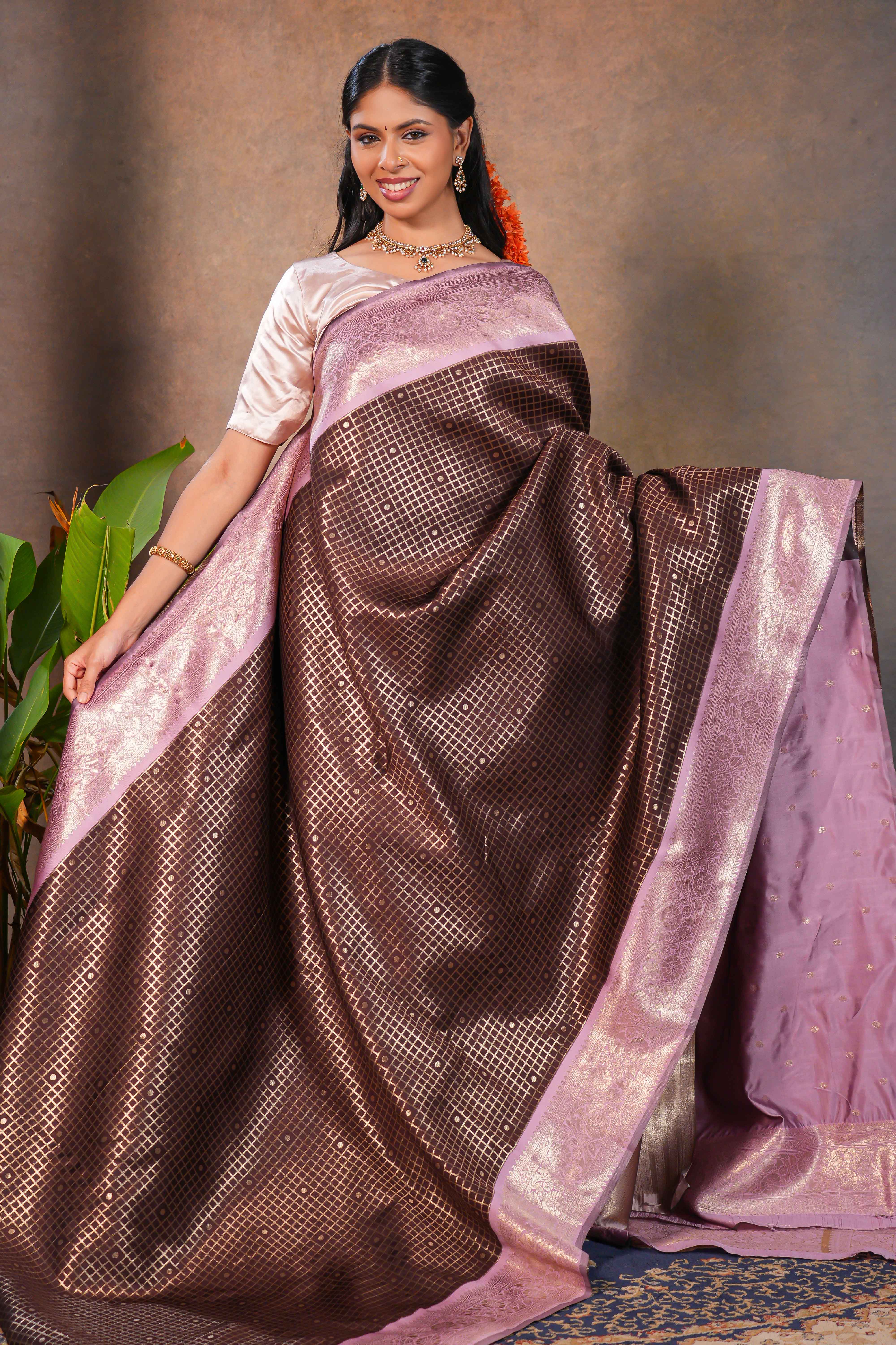 Dark brown checked floral motifs design semi soft silk saree with contrast border and blouse