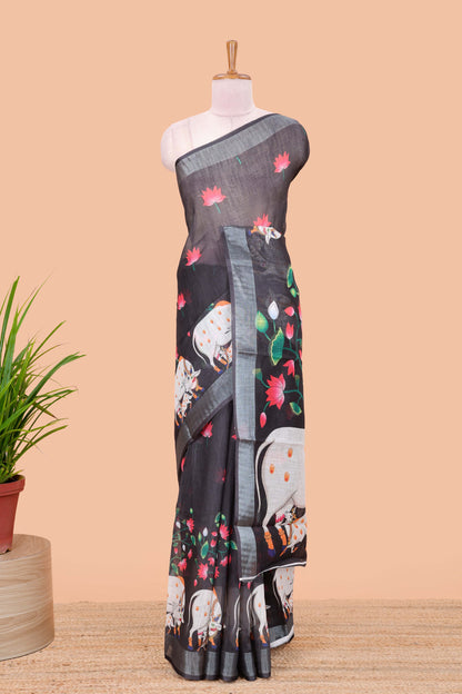 Black linen floral and animal themed print saree with zari border
