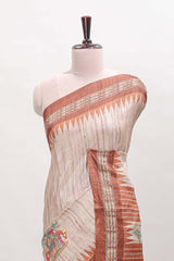 Tussar saree in beige tone delicate floral embroidery featuring rust-brown borders and woven pallu along with contrast blouse