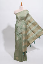 Borderless green striped zari design tussar saree with self pallu and matching blouse