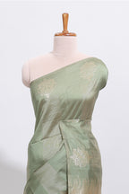 Borderless green striped zari design tussar saree with self pallu and matching blouse
