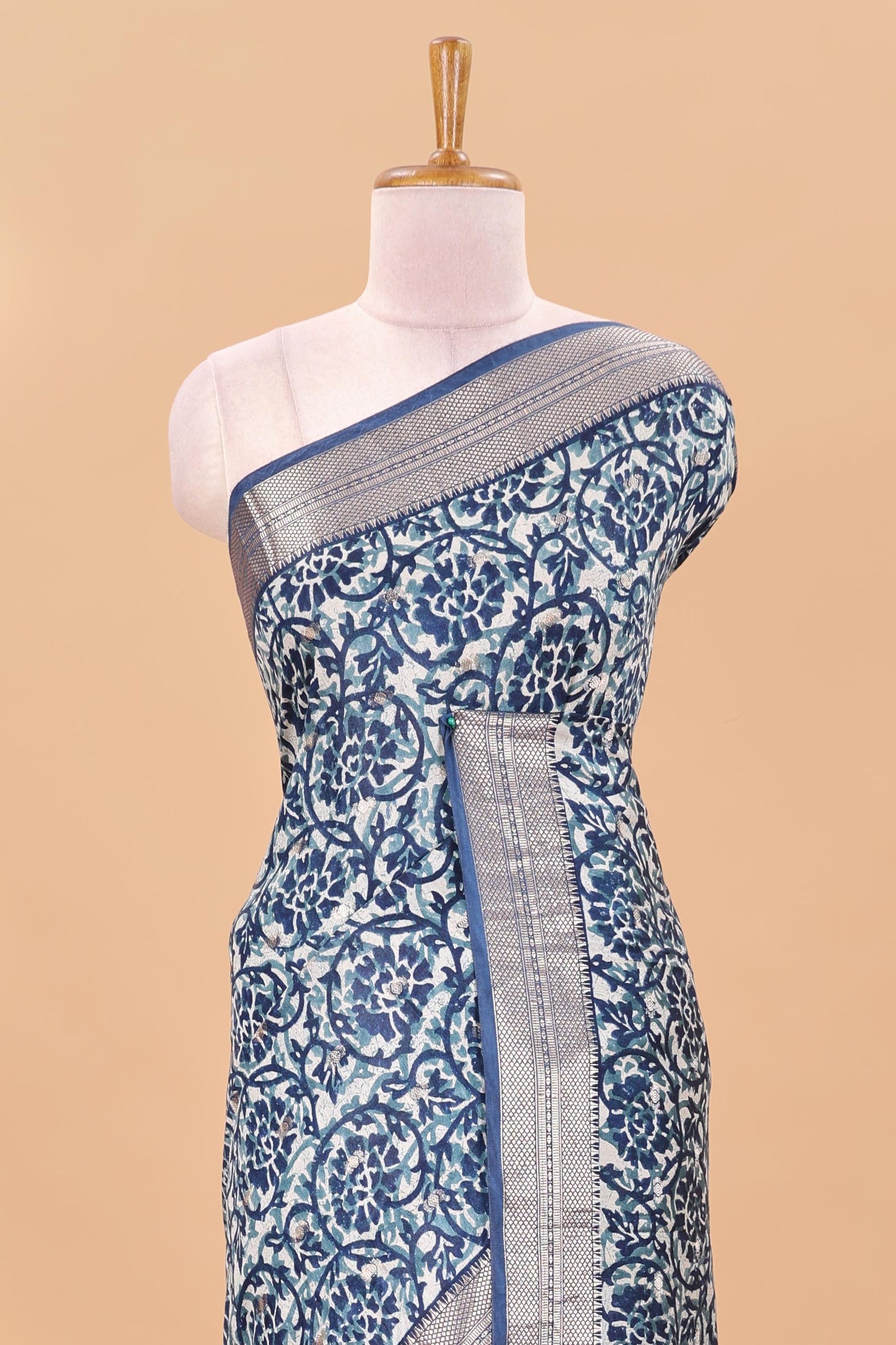 Cream chanderi cotton saree with floral vines, contrast zari border and striped pallu