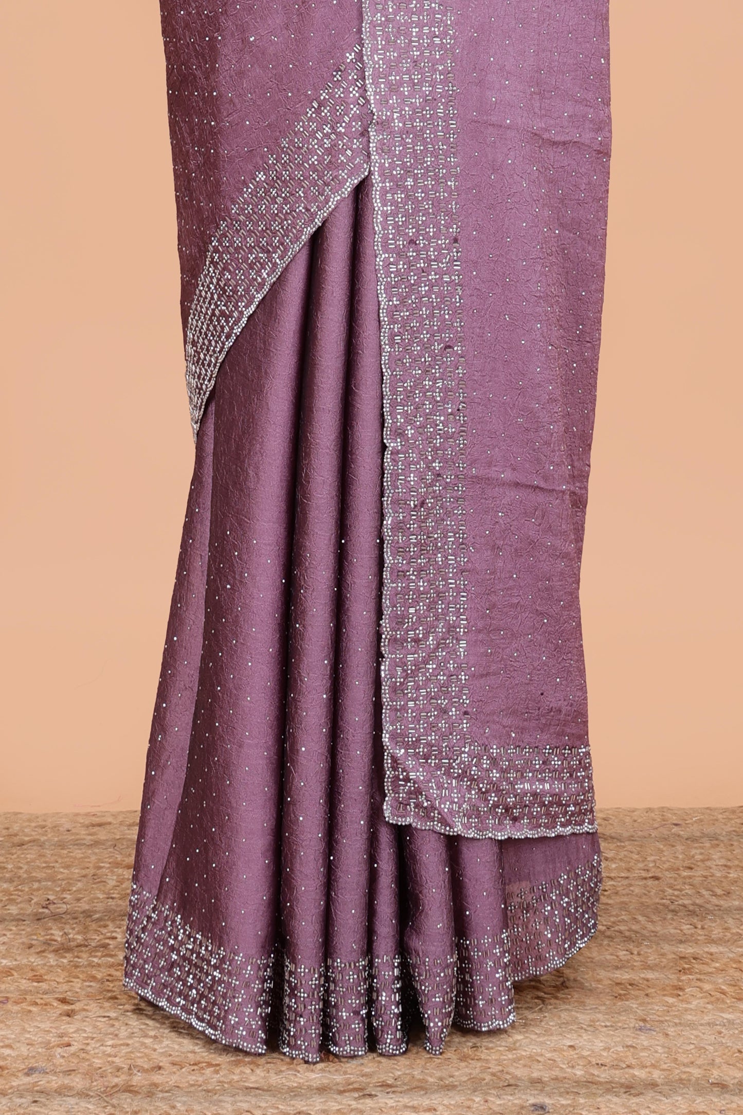 Pink chiffon georgette crush saree with all-over stone work, stone & beads border, and short stone work pallu with contrast embroidery blouse
