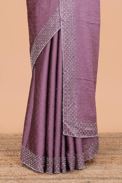 Pink chiffon georgette crush saree with all-over stone work, stone & beads border, and short stone work pallu with contrast embroidery blouse