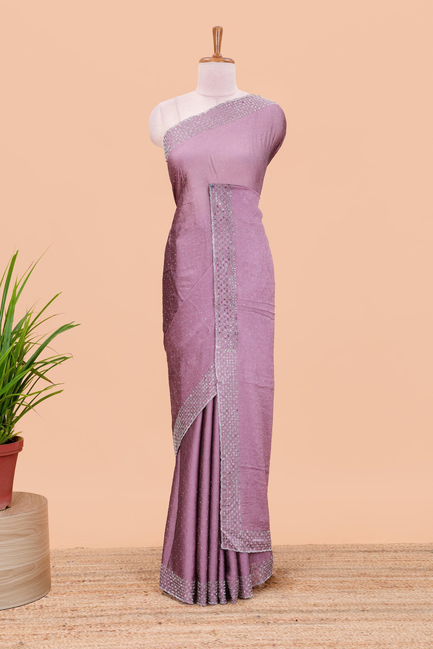 Pink chiffon georgette crush saree with all-over stone work, stone & beads border, and short stone work pallu with contrast embroidery blouse