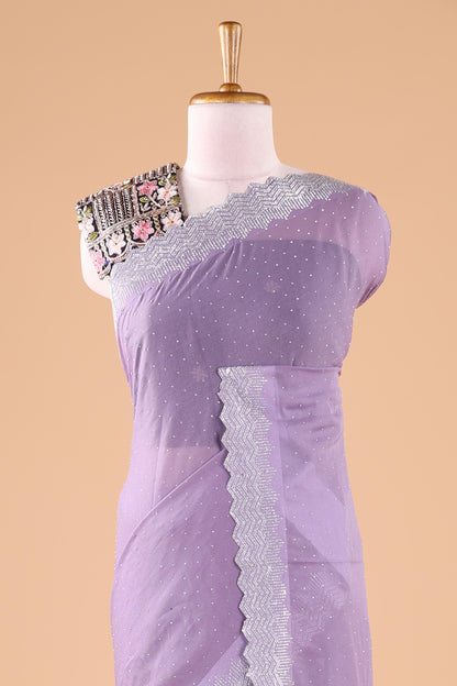 Lavender designer georgette space silk saree with heavy stone & beads work, short pallu and contrast sequin embroidered blouse