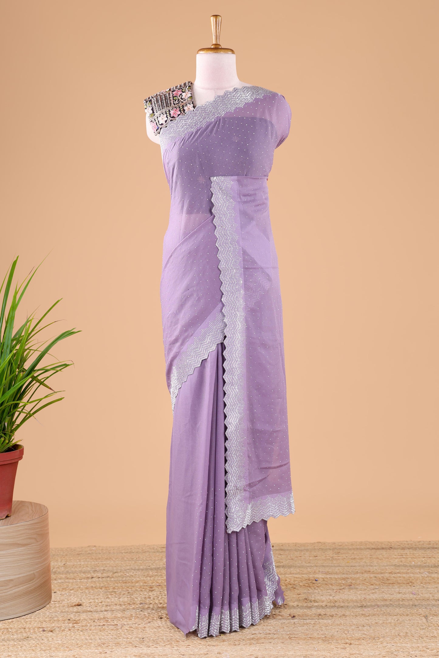Lavender designer georgette space silk saree with heavy stone & beads work, short pallu and contrast sequin embroidered blouse