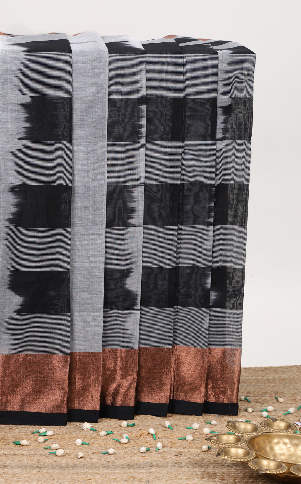 Grey striped bengal cotton saree with copper zari border and pallu