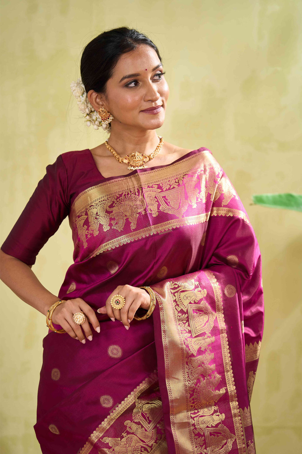 Kanchipuram Traditional Silk Saree in Magenta with Gold Zari Buttas & Self Border