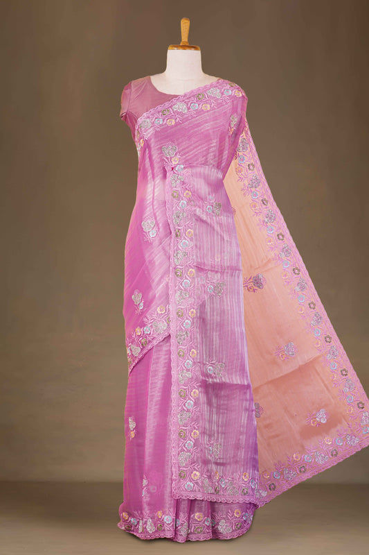 Pink saree with floral patterns