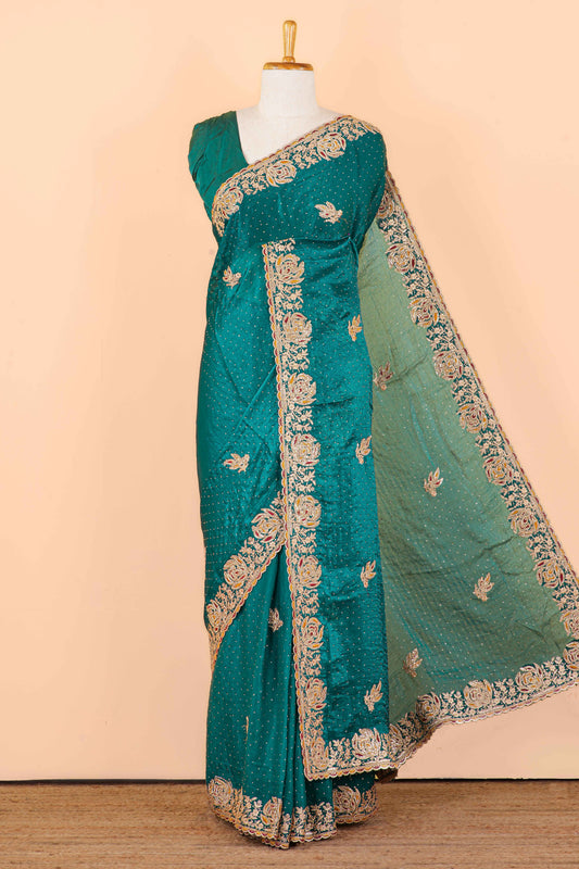 green with gold saree