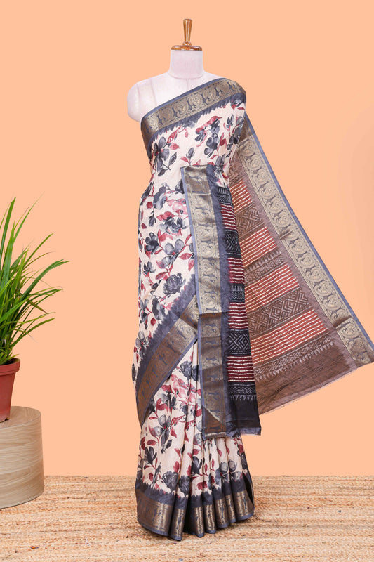Cream floral design semi dola silk saree with contrast grey zari border an blouse